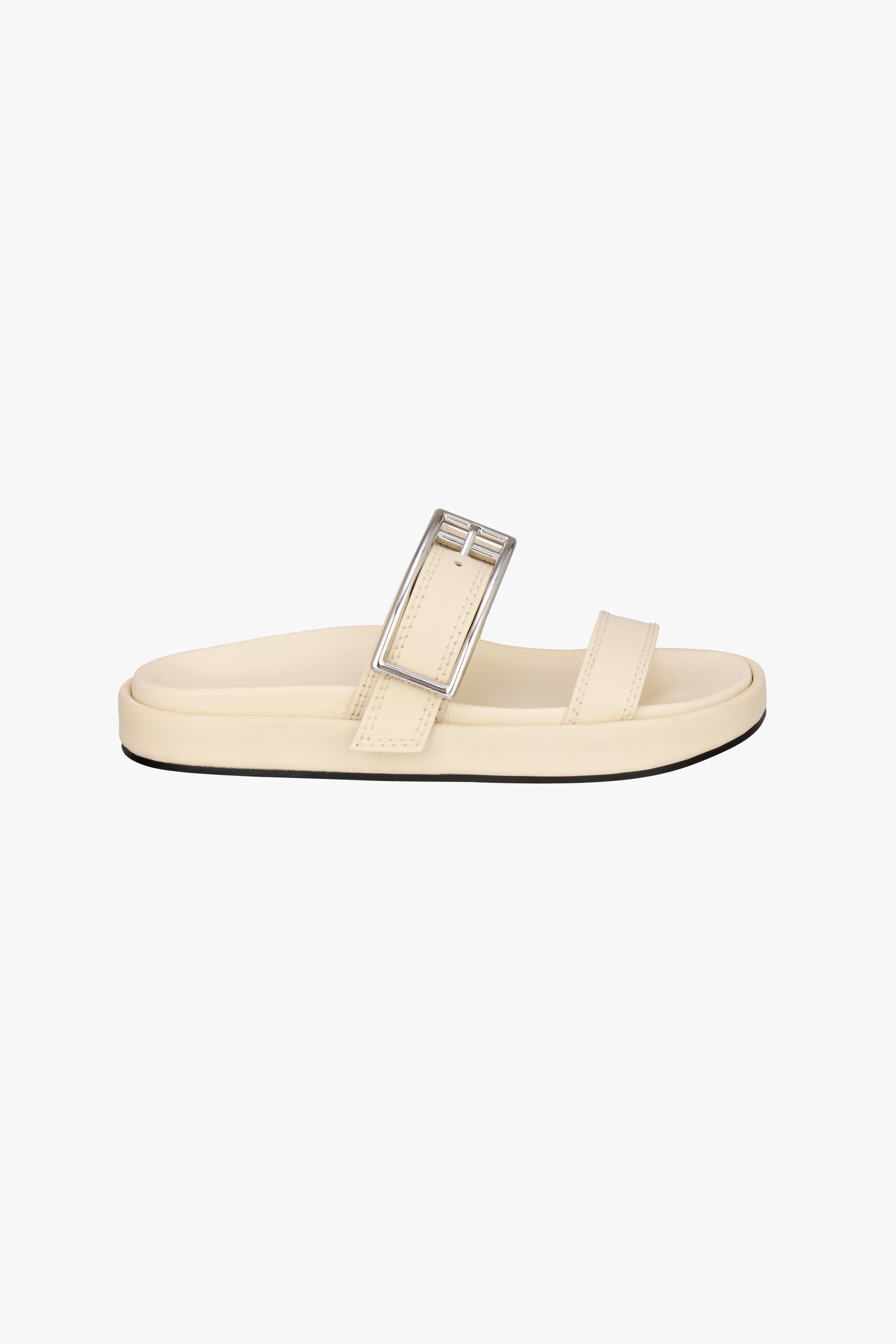 

Шлепанцы женские ZARA 223426 белые 38 RU (доставка из-за рубежа), 223426