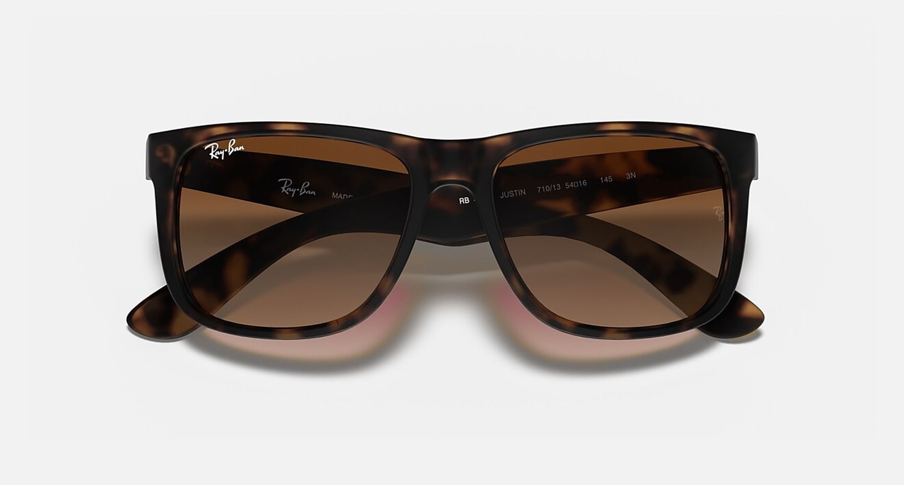 

Солнцезащитные очки унисекс Ray-Ban RB4165 коричневые, RB4165