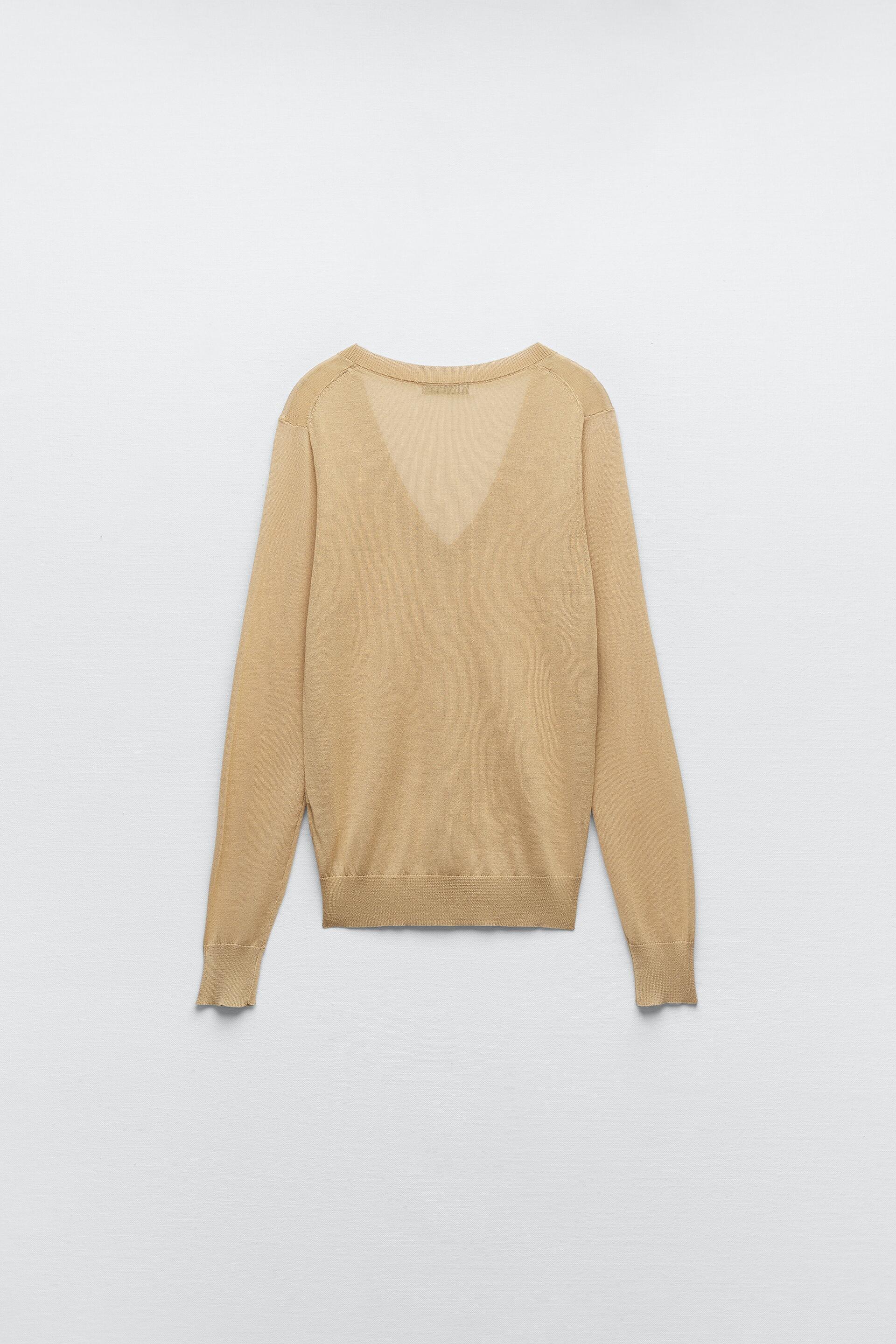 

Пуловер женский ZARA 09598124 золотистый S (доставка из-за рубежа), 09598124