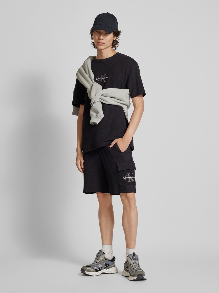 

Футболка мужская Calvin Klein Jeans J30J325645 черная XXL, Черный, J30J325645
