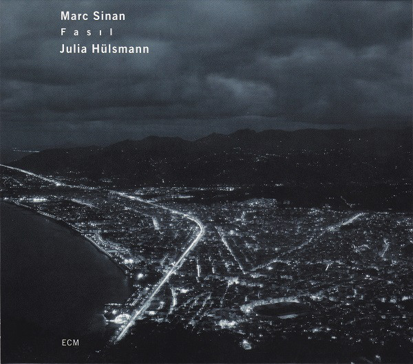

Marc Sinan [guitar], Julia Hulsmann [piano]: Fasil'. (1 CD)