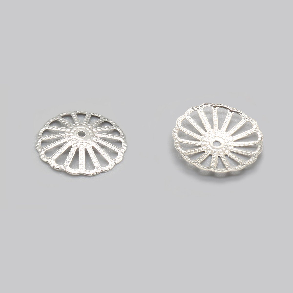 

Шапочка декоративная Astra&Craft FIN1285 14*3 мм 30 шт серебро, Серебристый