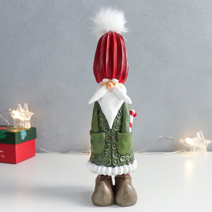 

Сувенир полистоун "Санта - факир в зелёной шубке" 7х8х24 см