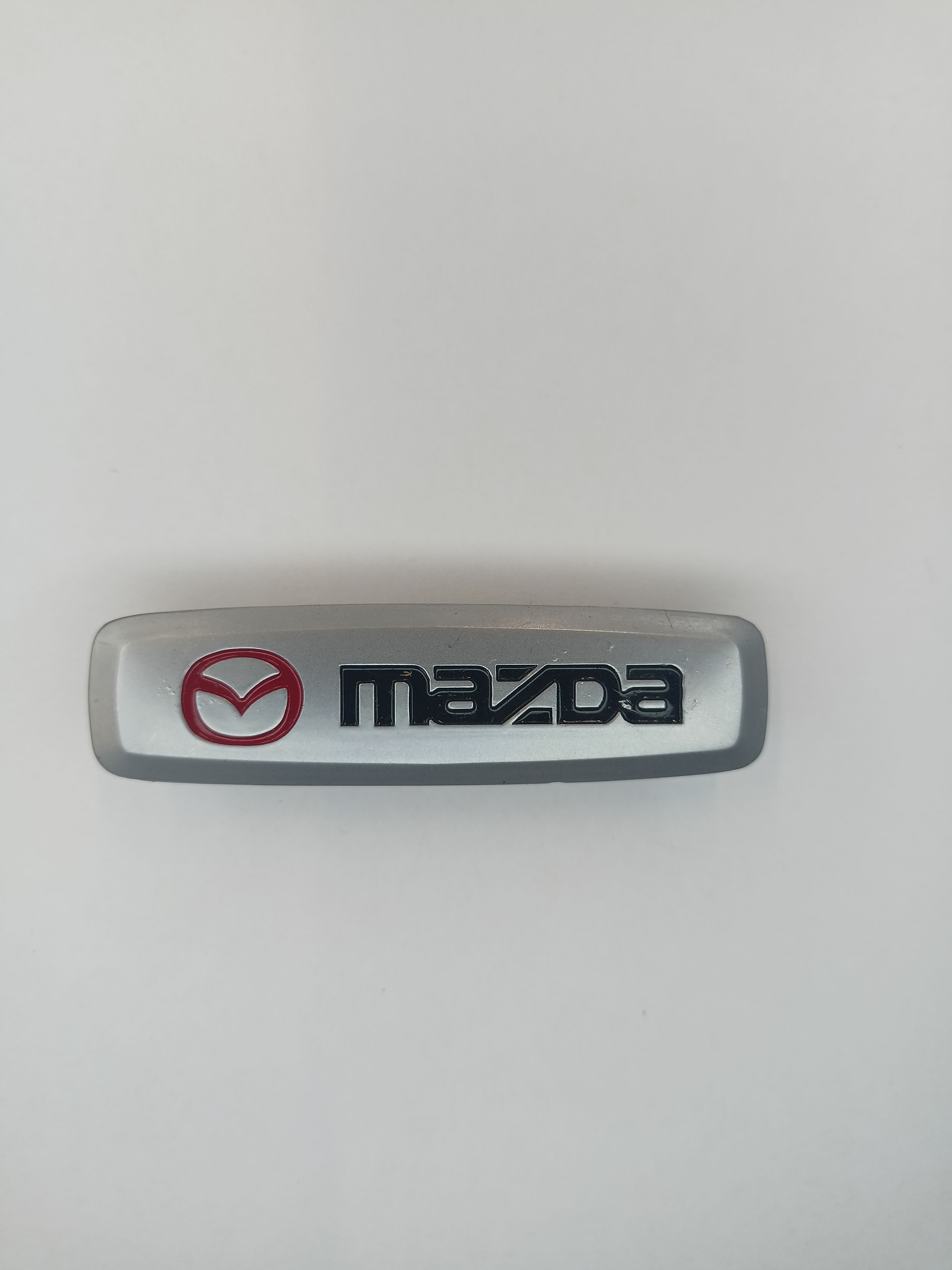

Логотип с маркой автомобиля для ЭВА ковриков MAZDA