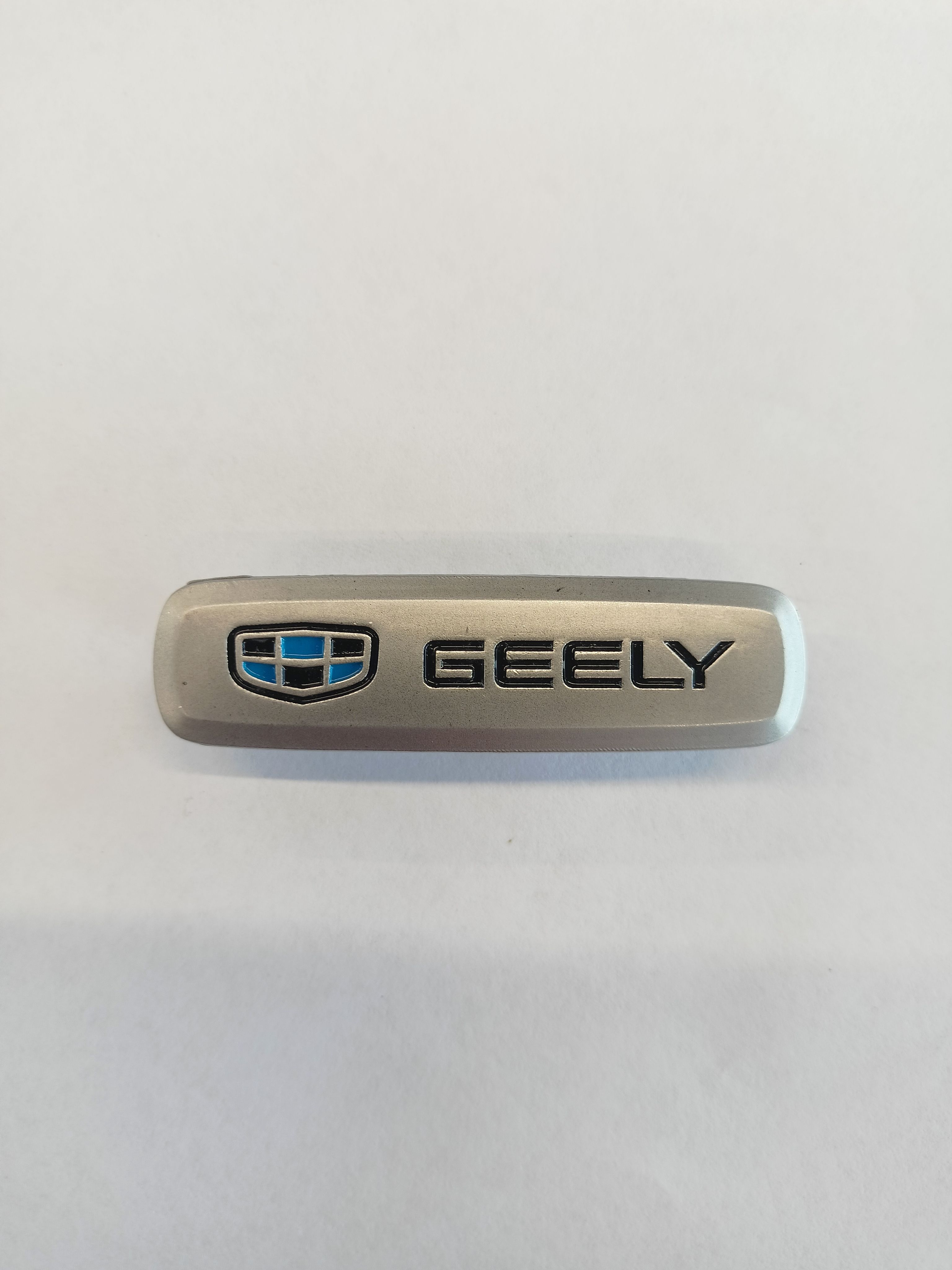 

Логотип с маркой автомобиля для ЭВА ковриков GEELY