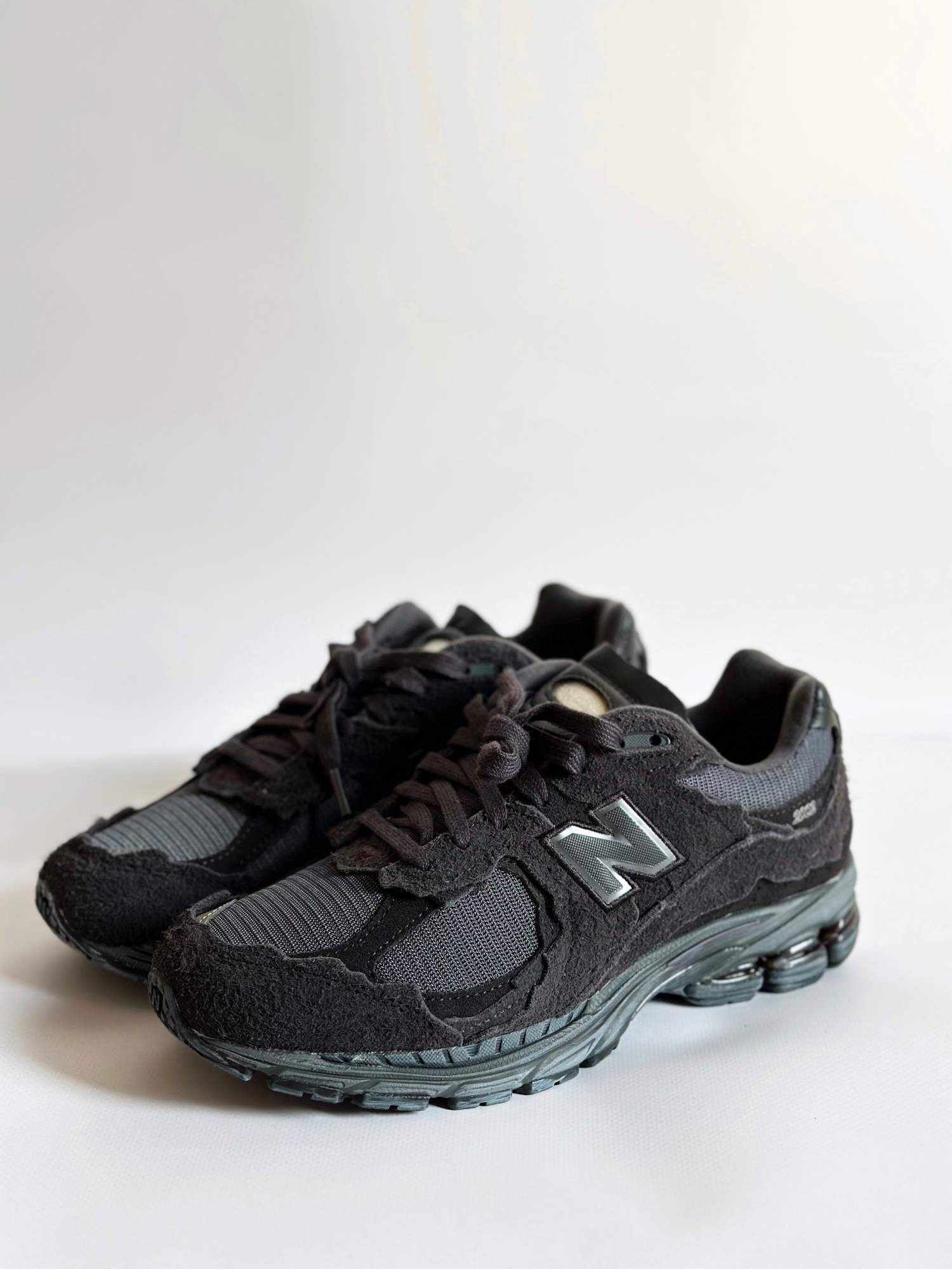 

Кроссовки унисекс New Balance 2002r черные 8 US, Черный, 2002r