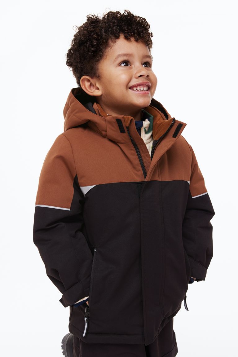 Куртка детская H&M 1108755, цвет черный/разноцветный, размер 140 (доставка из-за рубежа)