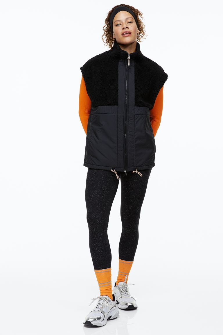 

Утепленный жилет женский H&M 0903998003 черный L (доставка из-за рубежа), 0903998003