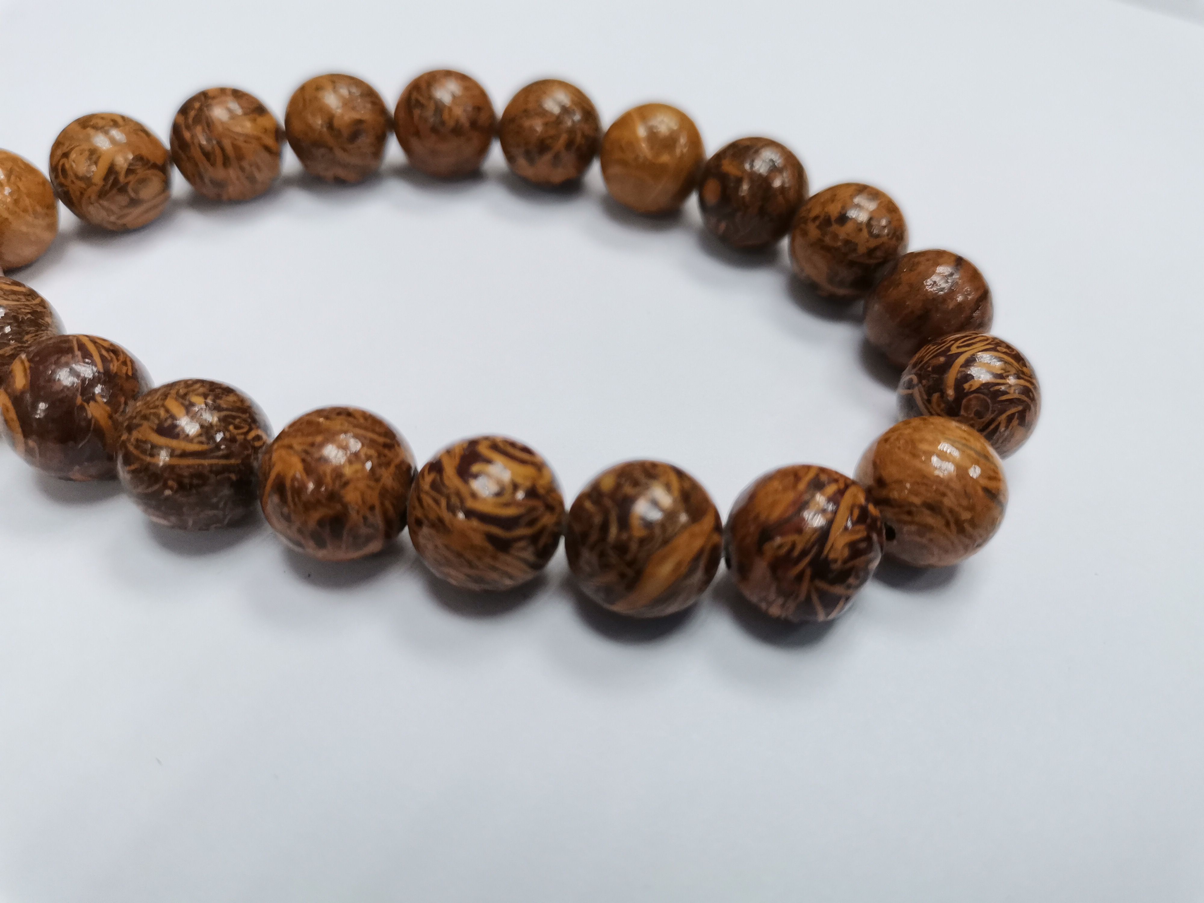 

Бусины из яшмы Мариам арабская вязь 10 мм, длина нити 39 см, 36 бусин beads2, Коричневый, beads2
