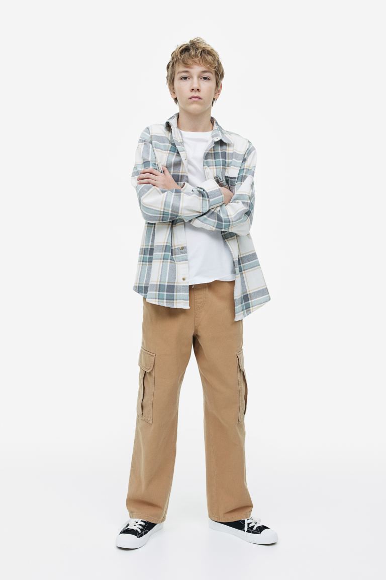 

Брюки детские H&M 1128394, цвет темно-бежевый, размер 170 (доставка из-за рубежа), 1128394