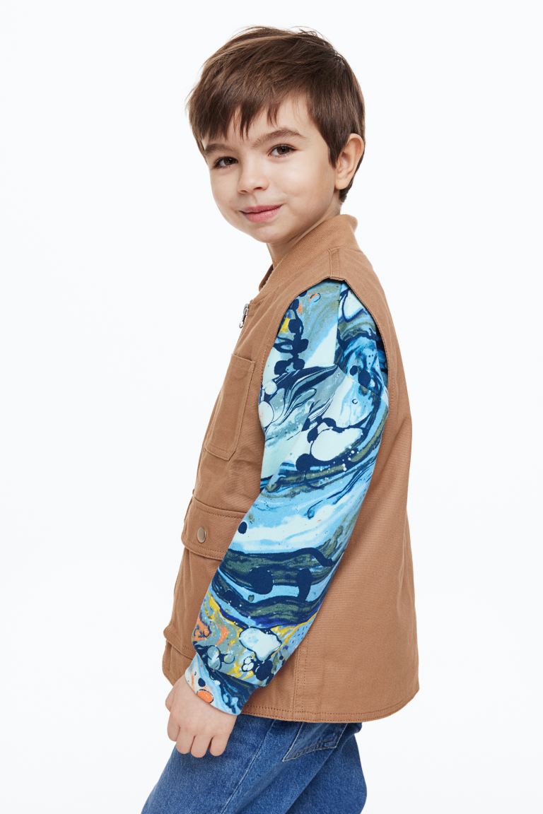

Жилет детский H&M 1130308, цвет темно-бежевый, размер 134 (доставка из-за рубежа), 1130308