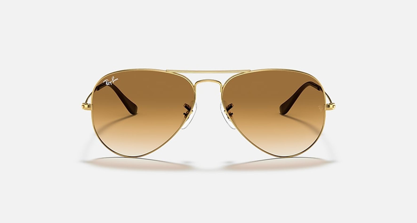 

Солнцезащитные очки унисекс Ray-Ban RB3025 коричневые, RB3025