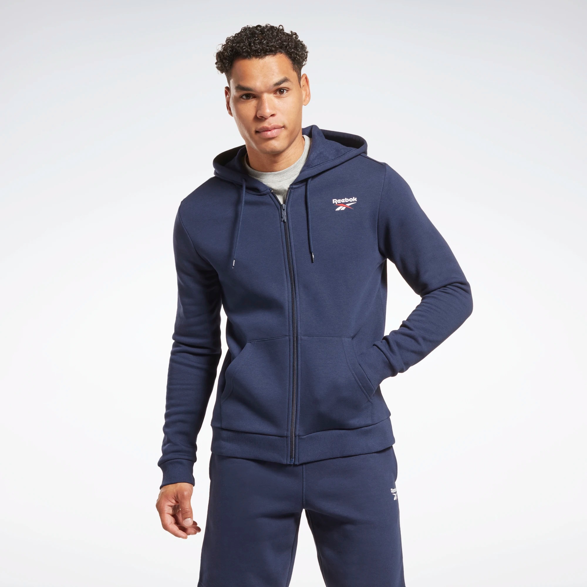 

Толстовка мужская Reebok Identity Fleece Full-Zip Hoodie синяя XS, Identity Fleece Full-Zip Hoodie