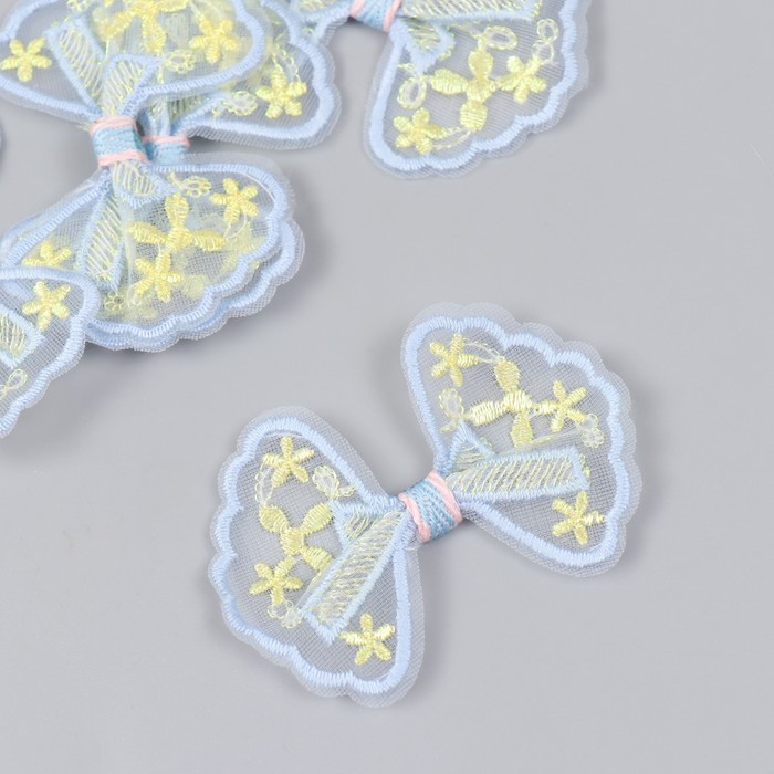 Декор для творчества текстиль вышивка "Бантик в цветочках голубовато-жёлтый" 7х5,5 см (5 ш 100059315706 голубой,  желтый