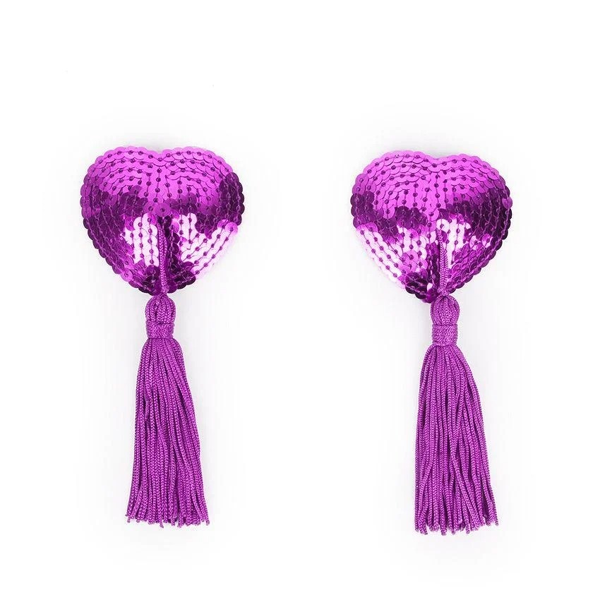 фото Фиолетовые текстильные пестисы в форме сердечек с кисточками bior toys