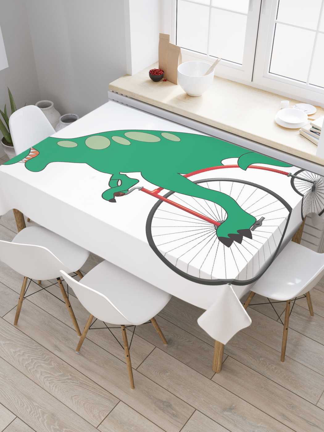 фото Скатерть прямоугольная joyarty "динозавр на велосипеде" из сатена, 120x145 см