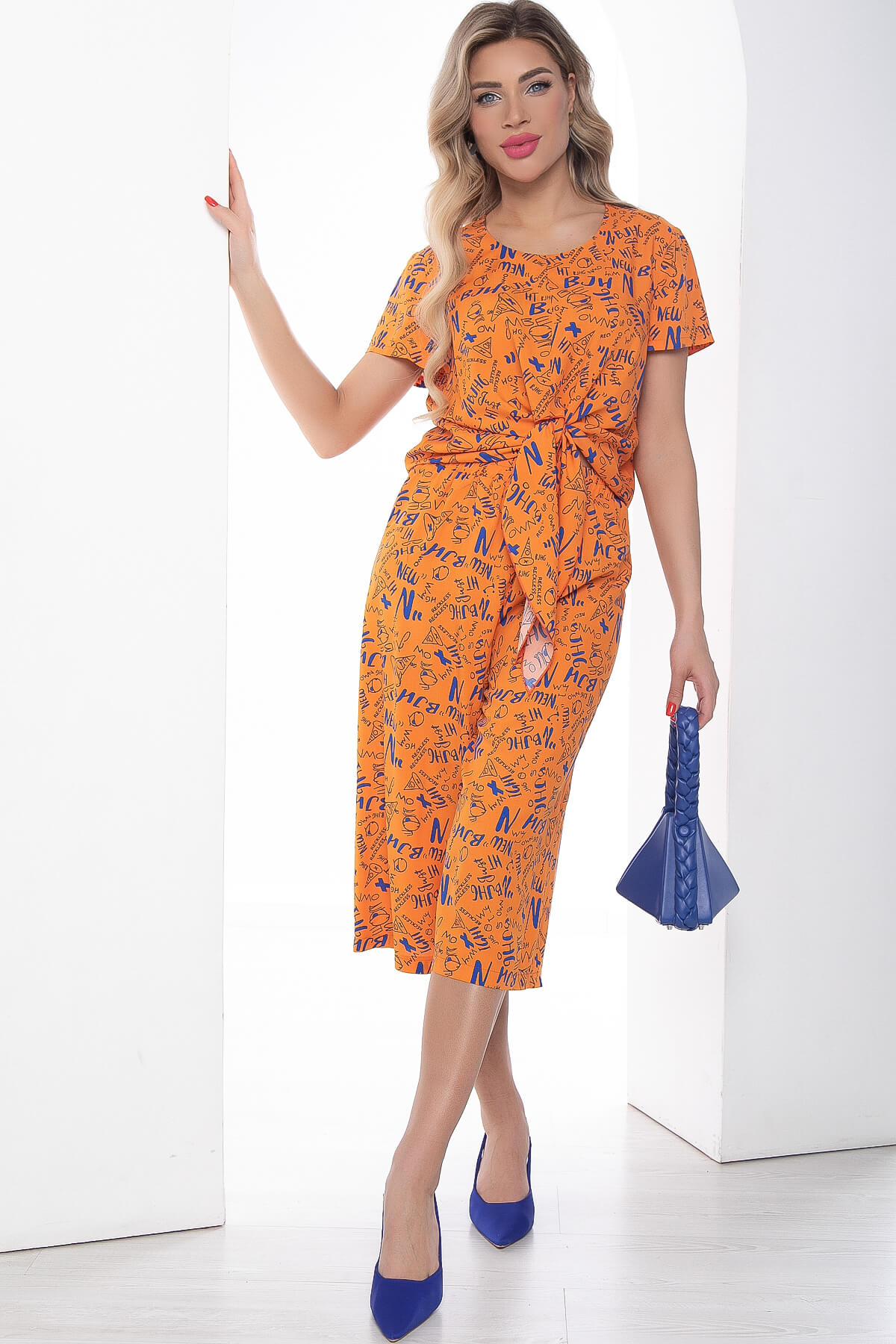 

Костюм женский LT Collection Остров стиля оранжевый 46 RU, Остров стиля