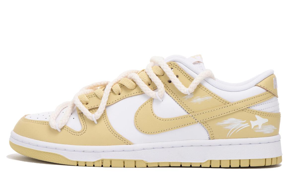 

Кеды унисекс Nike Dunk Low Team Gold Vibe белые 39 EU, Белый, Dunk Low Team Gold Vibe