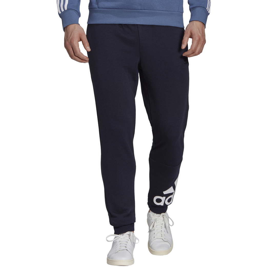 

Спортивные брюки мужские Adidas Essentials Tapered Cuff Logo Pant синие S, Essentials Tapered Cuff Logo Pant