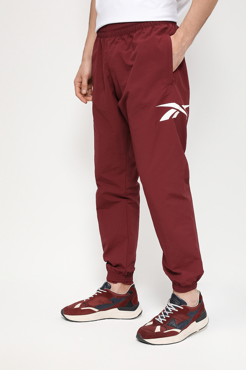 

Спортивные брюки мужские Reebok IL4562 бордовые M, Бордовый, IL4562