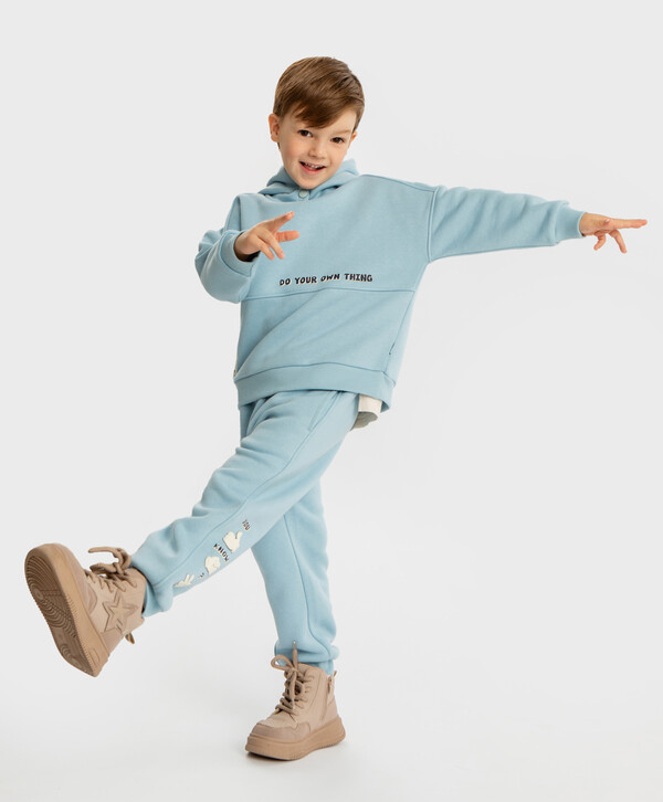 

Джоггеры утепленные объемным принтом голубые Button Blue, 122, 224BBBMC5601, Голубой, 224BBBMC5601