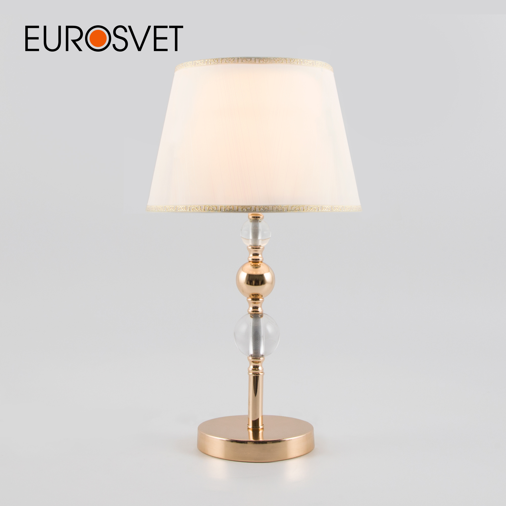

Настольная лампа с тканевым абажуром Eurosvet Sortino 01071/1 Е27 золото