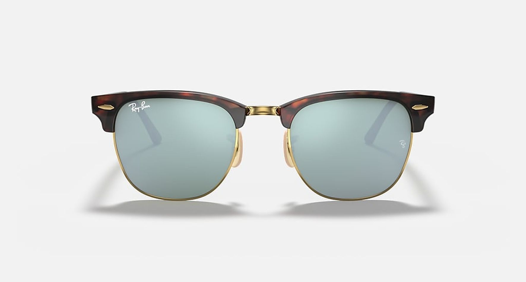 

Солнцезащитные очки унисекс Ray-Ban RB3016 коричневые, RB3016