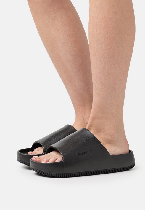 

Сланцы женские Nike Calm черные 40.5 EU (доставка из-за рубежа), Черный, Calm