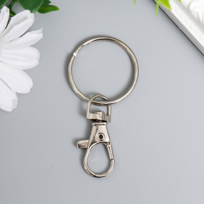 

Брелок женский NoBrand 9376851-12p серебристый, 9376851-12p