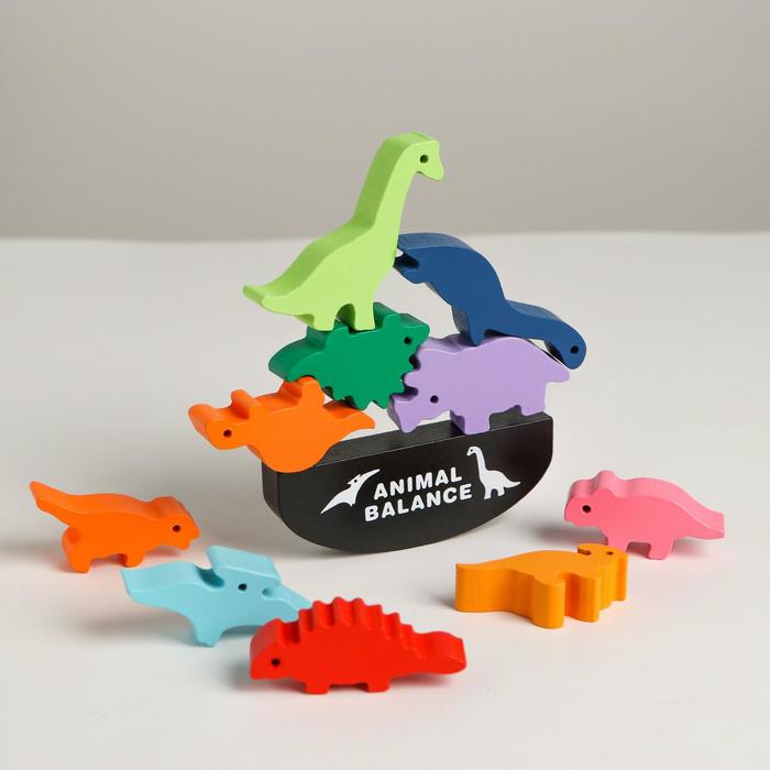 фото Развивающая игра балансир «динозавры» 13×20,5×3 см muqiy toys