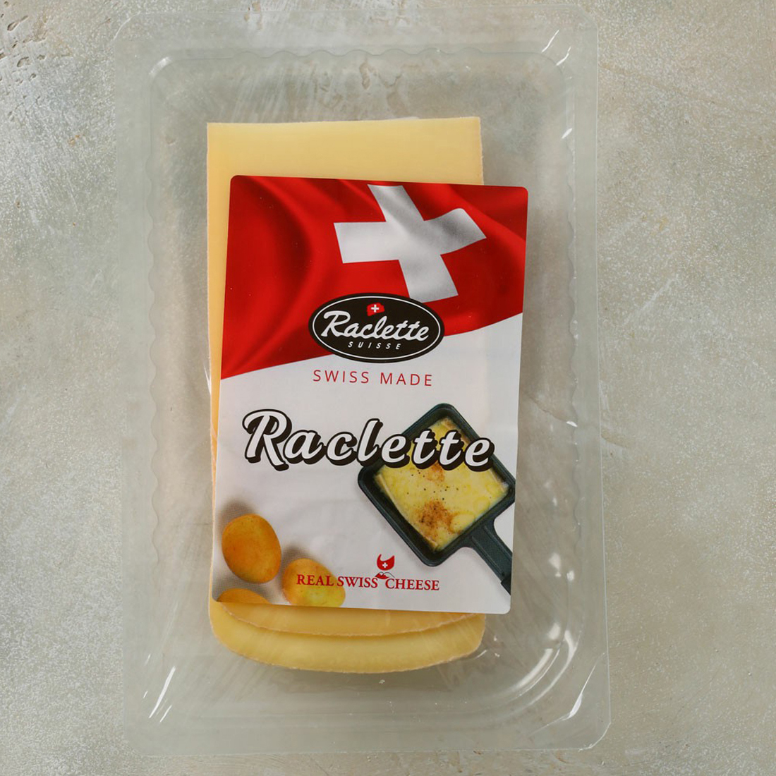 Сыр полутвердый Real Swiss Cheese Раклет 48% 125 г