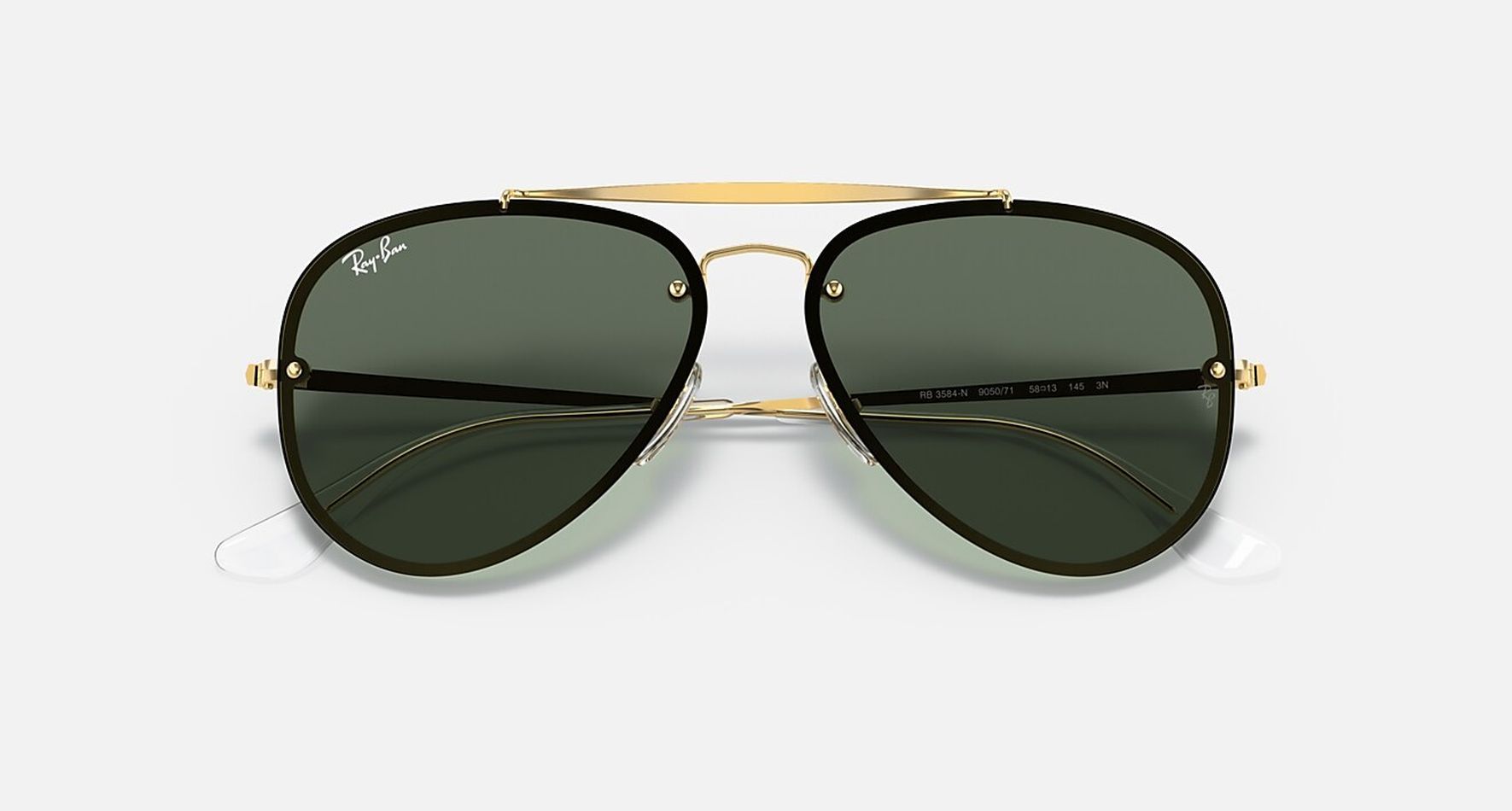 

Солнцезащитные очки унисекс Ray-Ban RB3584N золотистые/черные, RB3584N