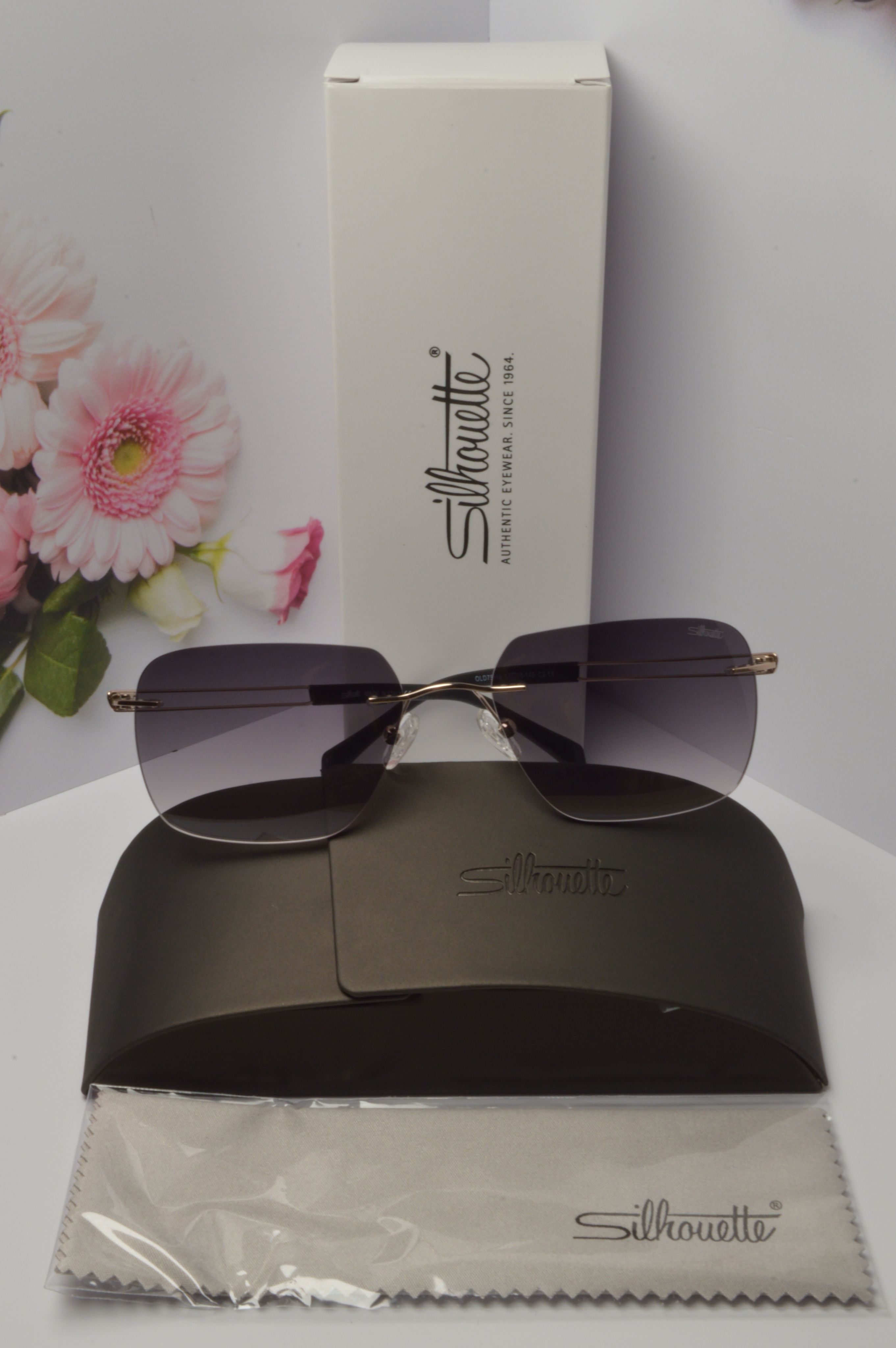 

Солнцезащитные очки унисекс Silhouette OL-SZO-Silhouette-OLD-7554-C2 фиолетовые, OL-SZO-Silhouette-OLD-7554-C2
