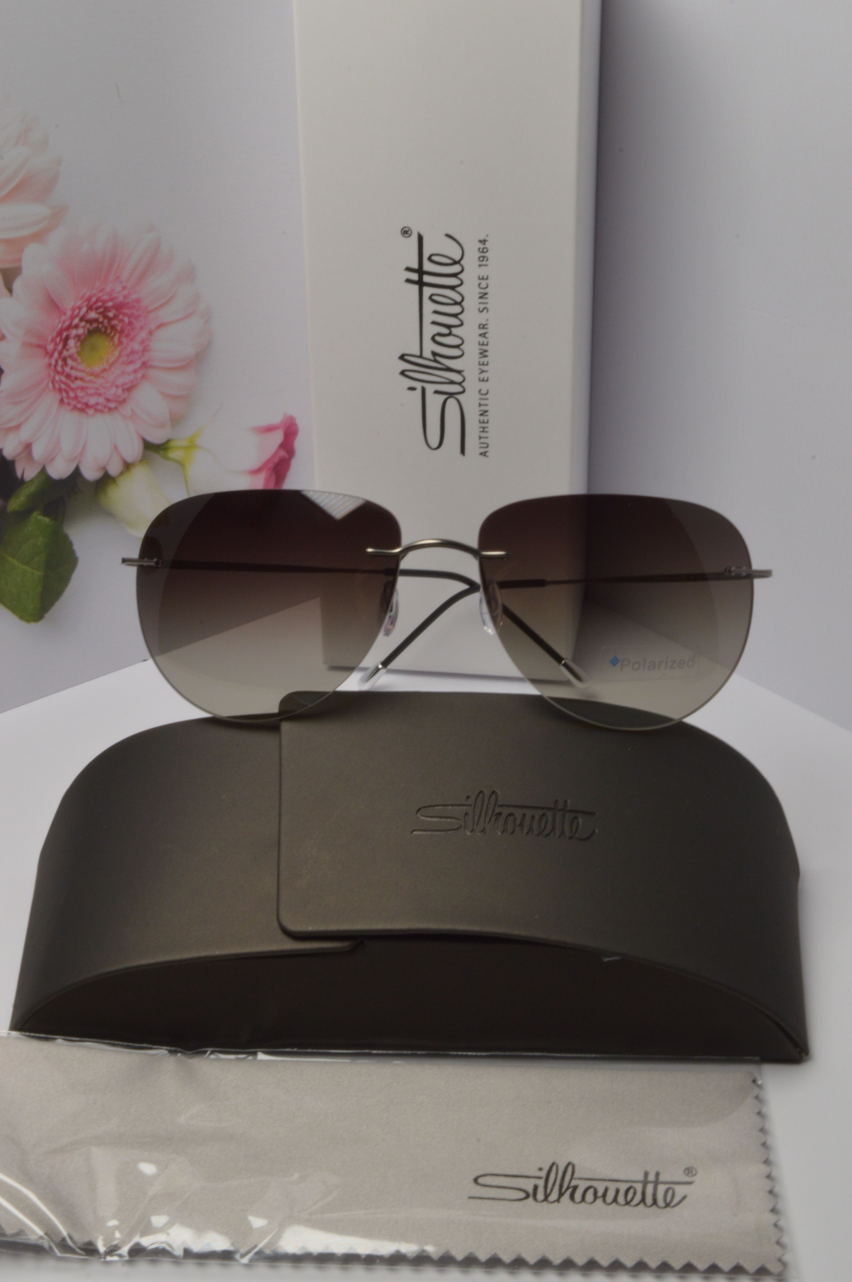 

Солнцезащитные очки унисекс Silhouette OL-SZO-Silhouette-8697-40-6560 серые, OL-SZO-Silhouette-8697-40-6560