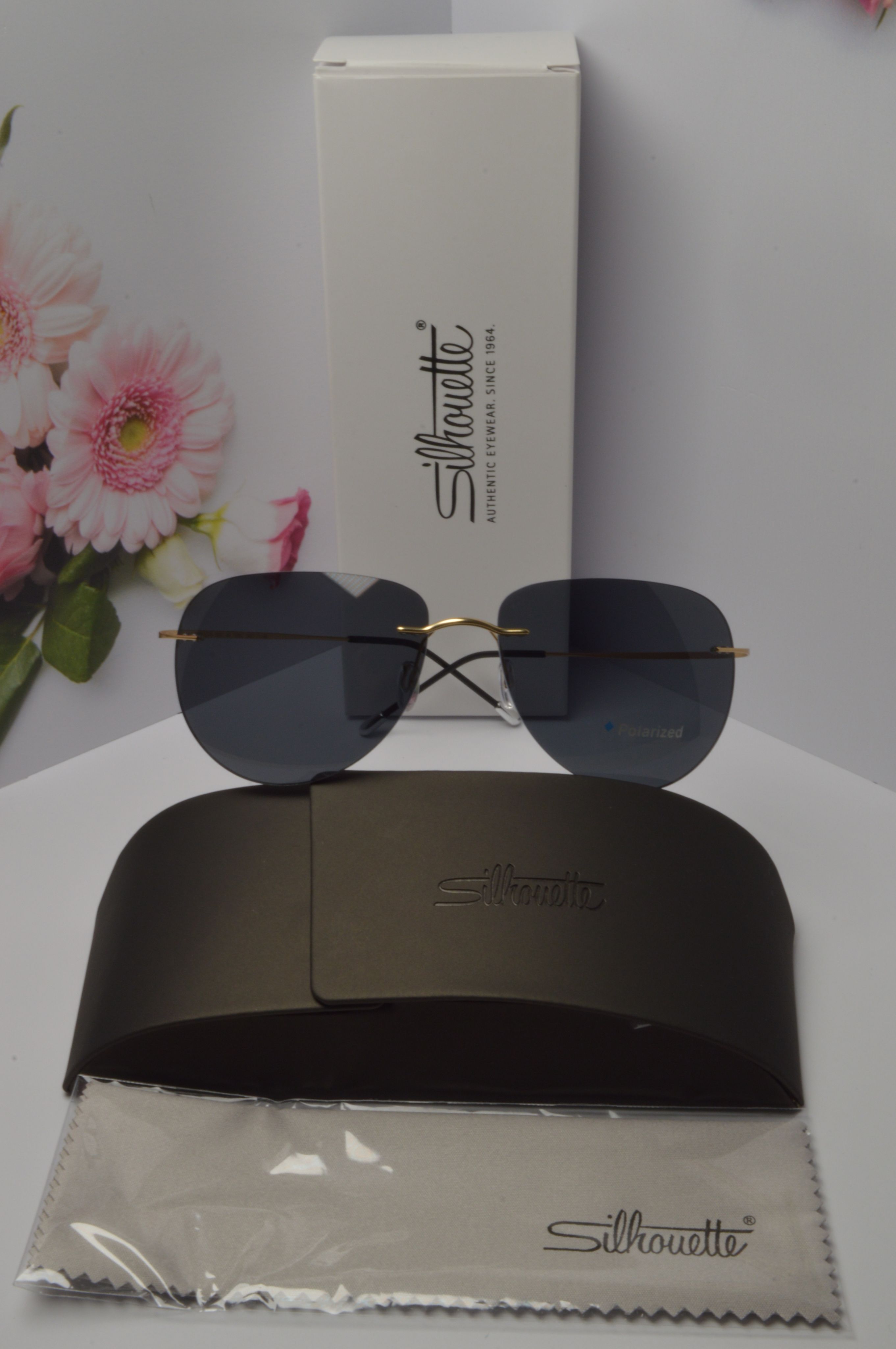 

Солнцезащитные очки унисекс Silhouette OL-SZO-Silhouette-8697-40-7530 черные, OL-SZO-Silhouette-8697-40-7530