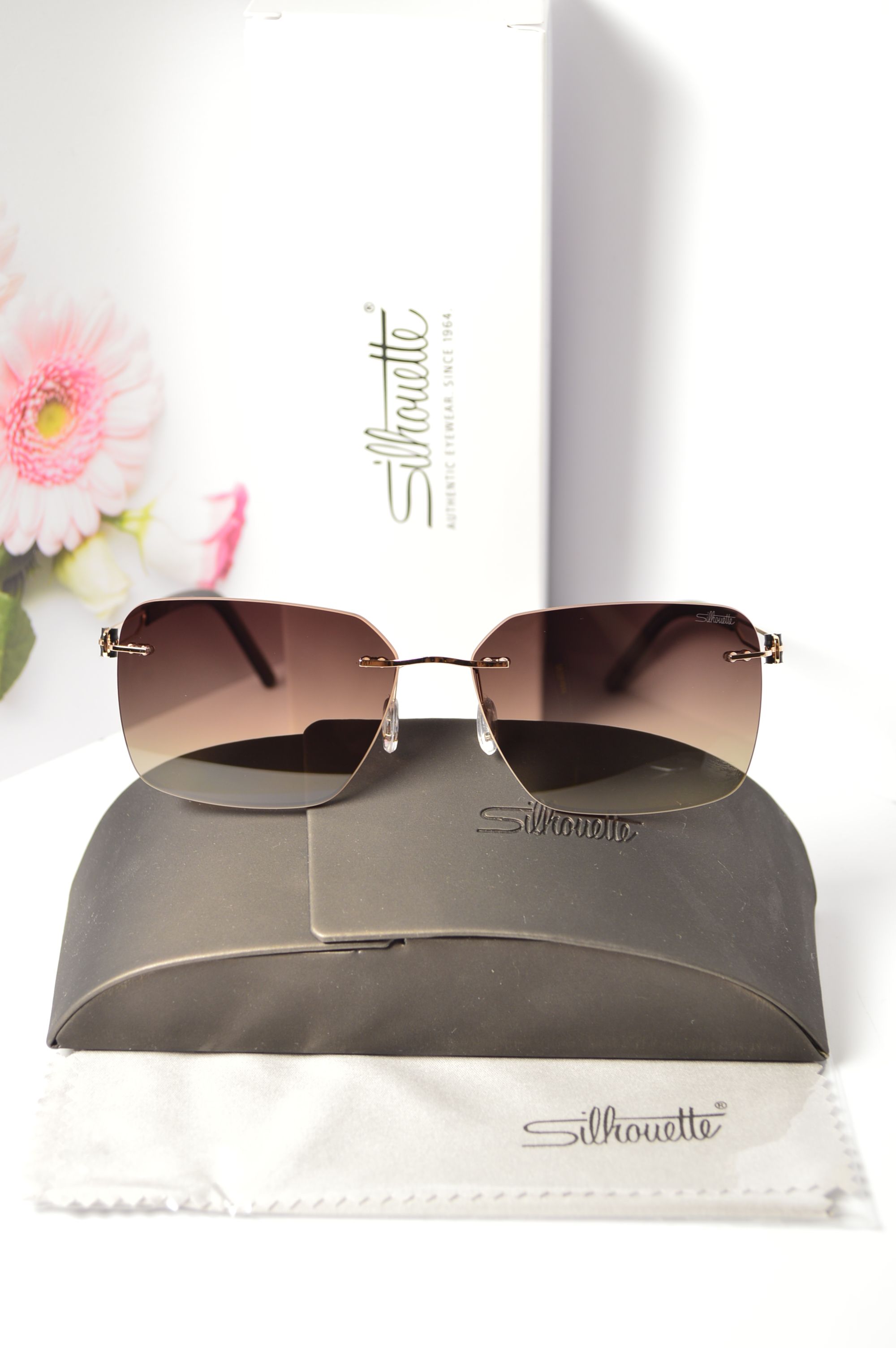 

Солнцезащитные очки унисекс Silhouette OL-OM-Silhouette-66010-C05 коричневые, OL-OM-Silhouette-66010-C05
