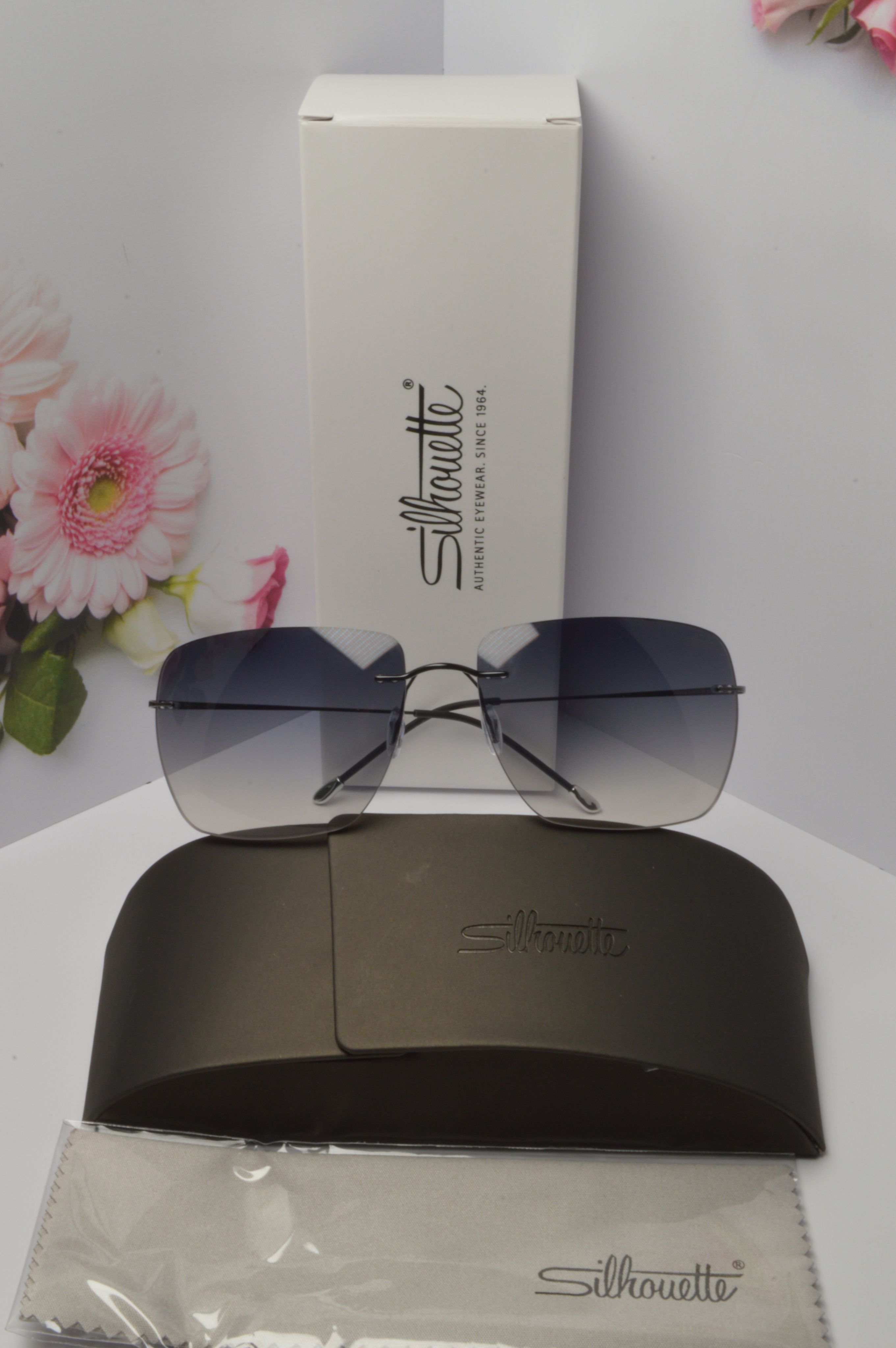 

Солнцезащитные очки унисекс Silhouette OL-SZO-Silhouette-ver2-7578-40-6051 синие, OL-SZO-Silhouette-ver2-7578-40-6051