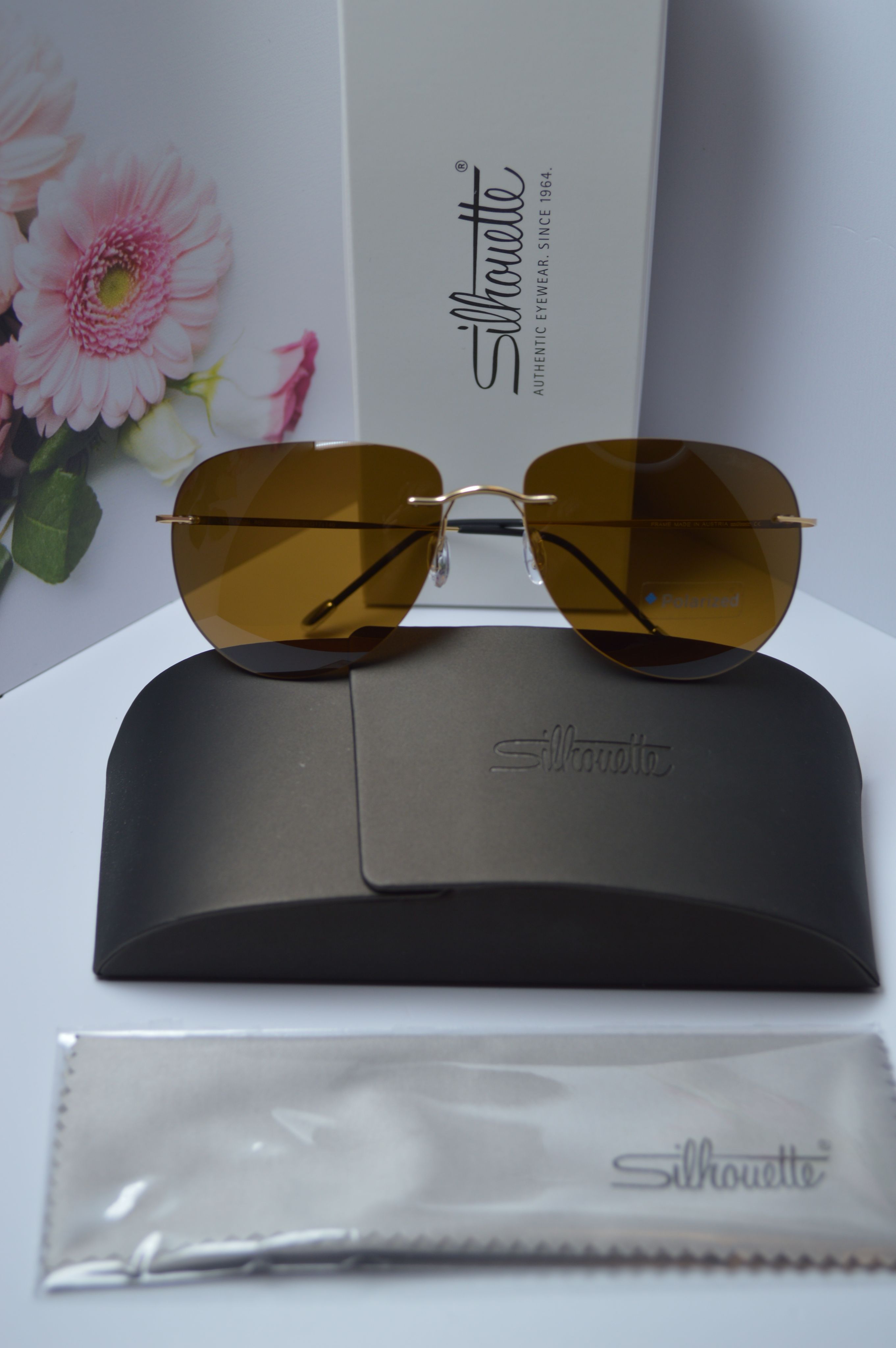 

Солнцезащитные очки унисекс Silhouette OL-SZO-Silhouette-8697-40-7630A коричневые, OL-SZO-Silhouette-8697-40-7630A