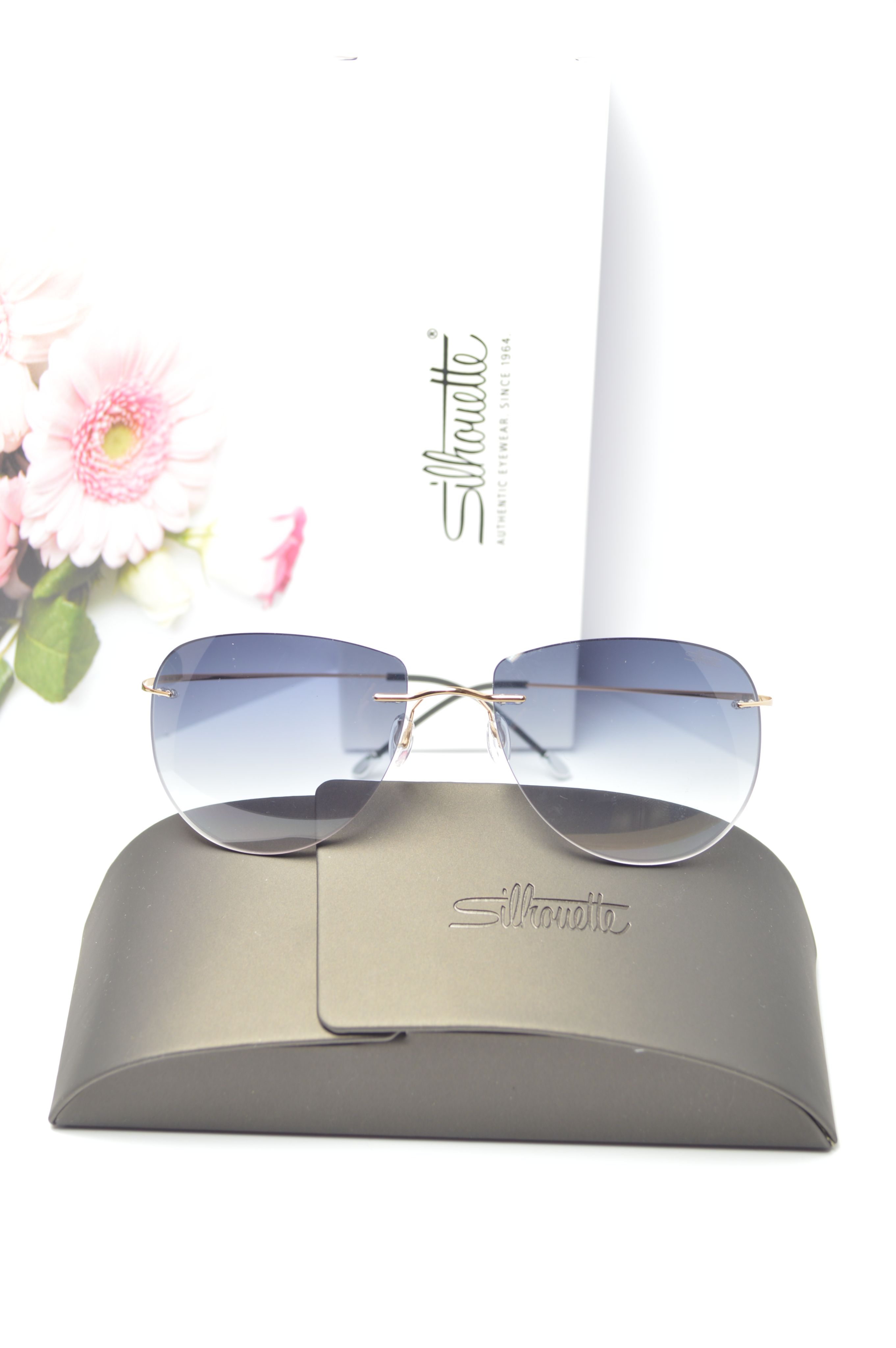 

Солнцезащитные очки унисекс Silhouette OL-SZO-Silhouette-7578-40-6054-gold-grey голубые, OL-SZO-Silhouette-7578-40-6054-gold-grey