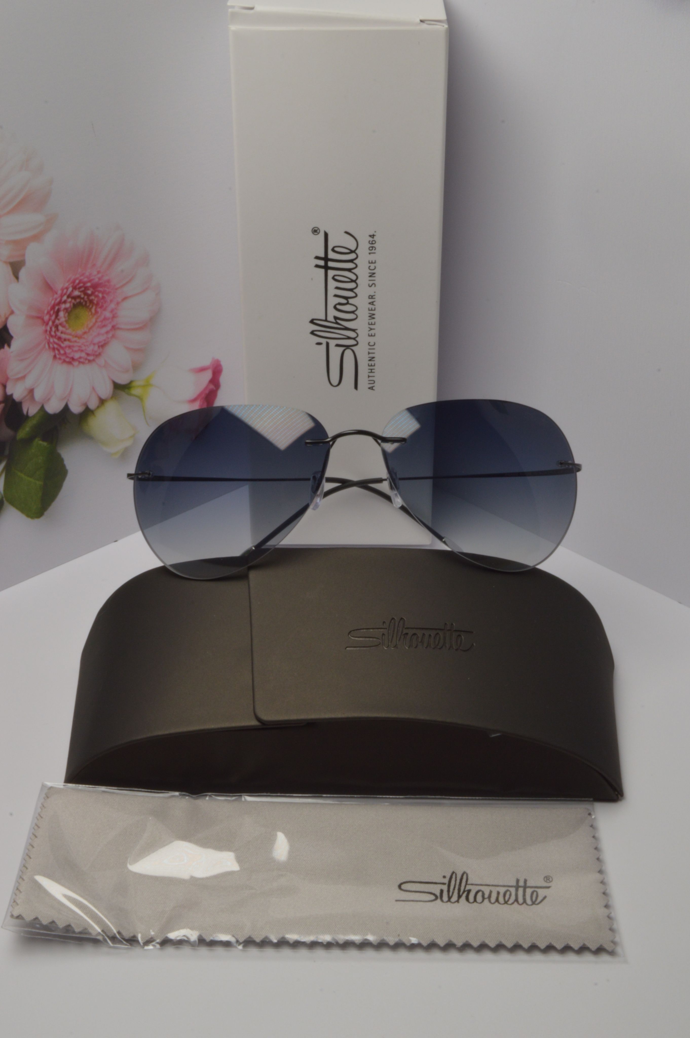 

Солнцезащитные очки унисекс Silhouette OL-SZO-Silhouette-avi-7578-40-6053-black-grey синие, OL-SZO-Silhouette-avi-7578-40-6053-black-grey