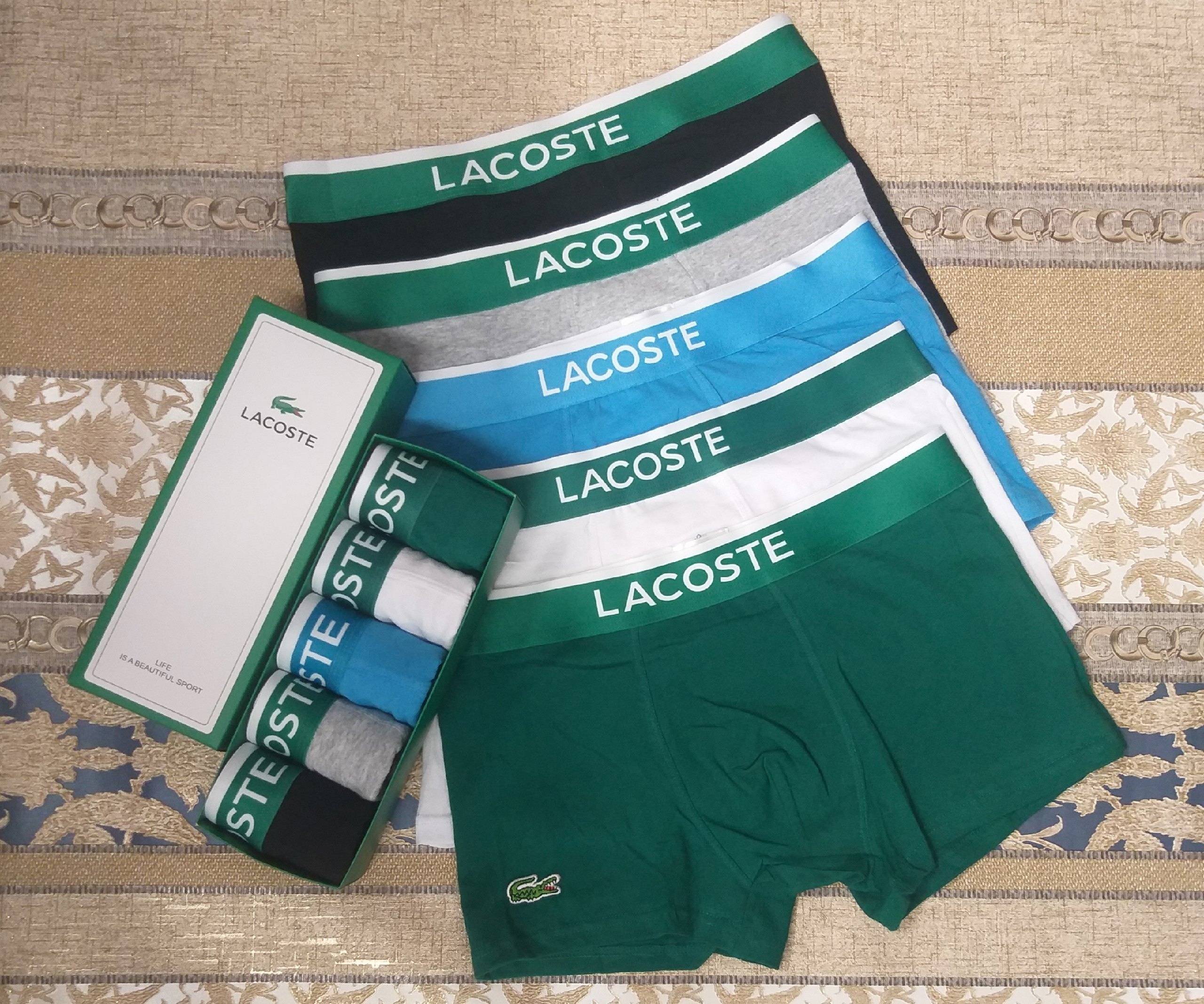 Комплект трусов мужских Lacoste LAC2 разноцветных 48-50 5 шт 1550₽