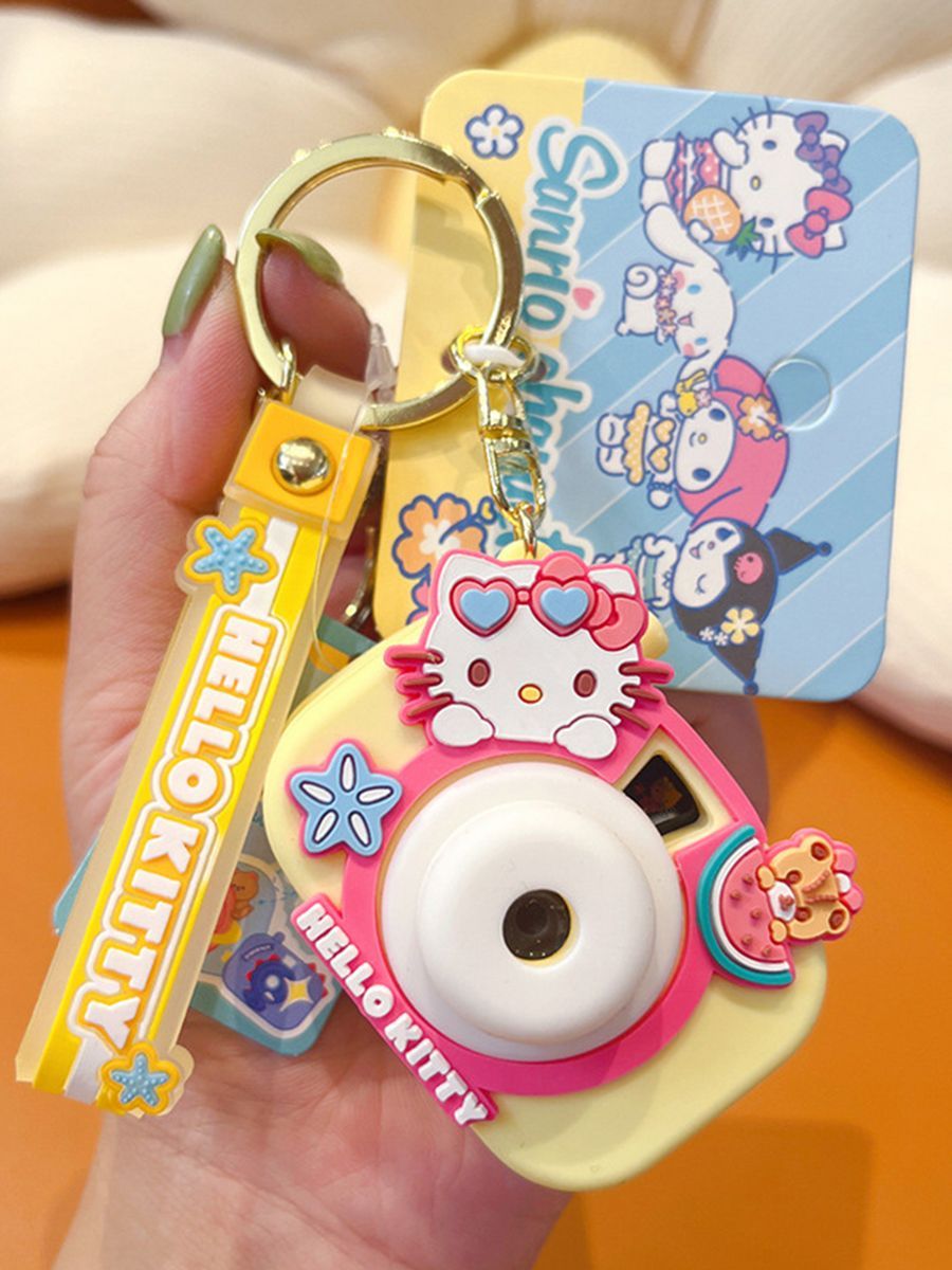 

Брелок женский STAREX Фотоаппарат Hello Kitty проектор розовый, Разноцветный, Фотоаппарат Hello Kitty проектор