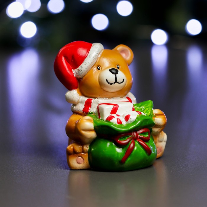 

Фигура "Медвежонок сидит с мешком" 8х11х10см