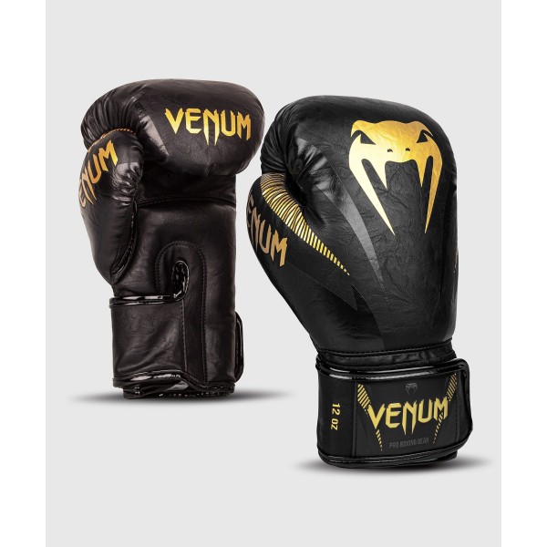 фото Боксерские перчатки venum impact черные/золотистые 14 унций