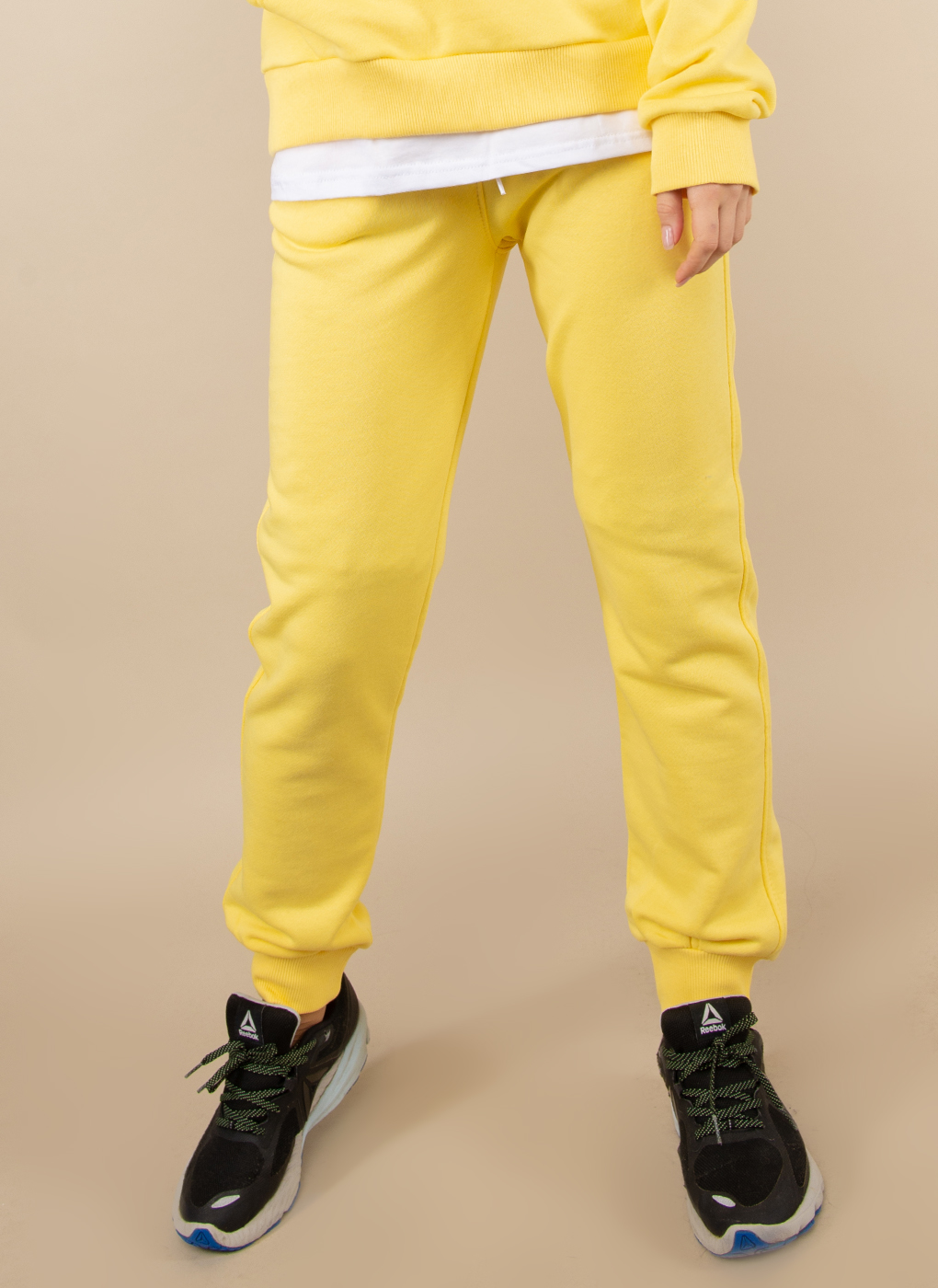 Спортивные брюки женские Каляев 50976 желтые 54-56 RU