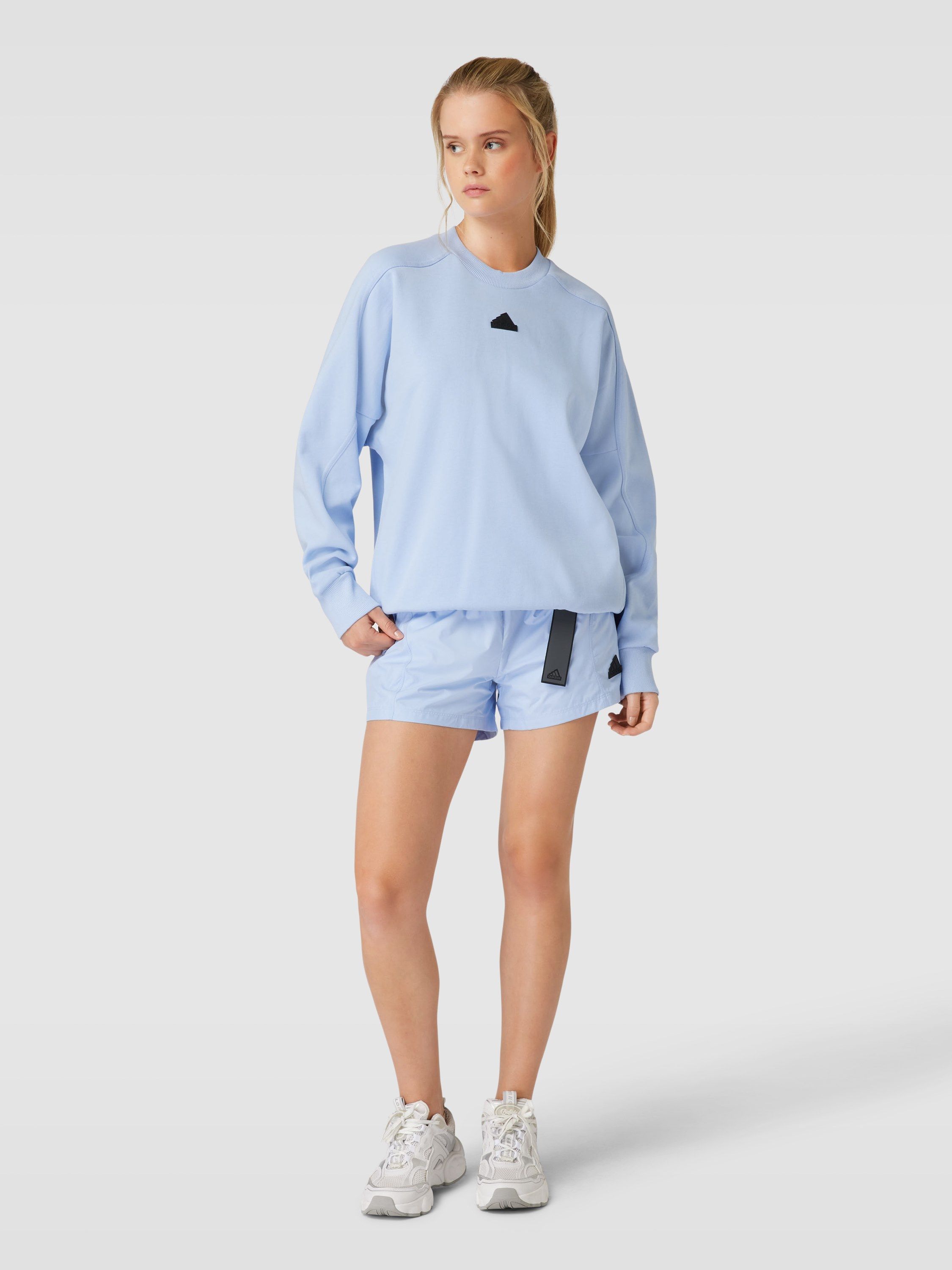 

Свитшот женский Adidas Sportswear 1710326 голубой S (доставка из-за рубежа), 1710326