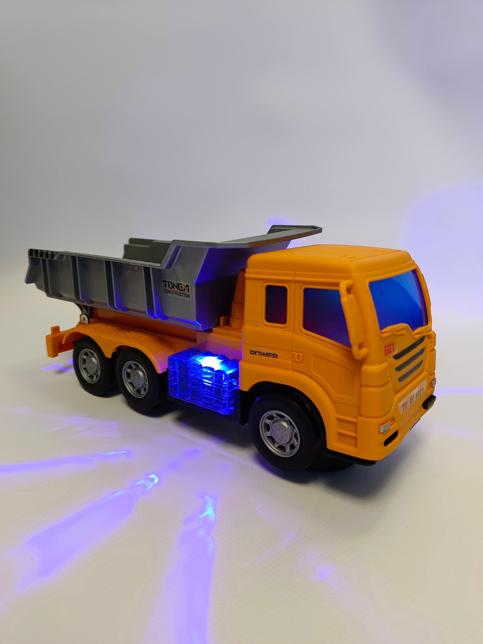 Машина камаз 1000toys оранжевый, свет и звук, размер 22107 см