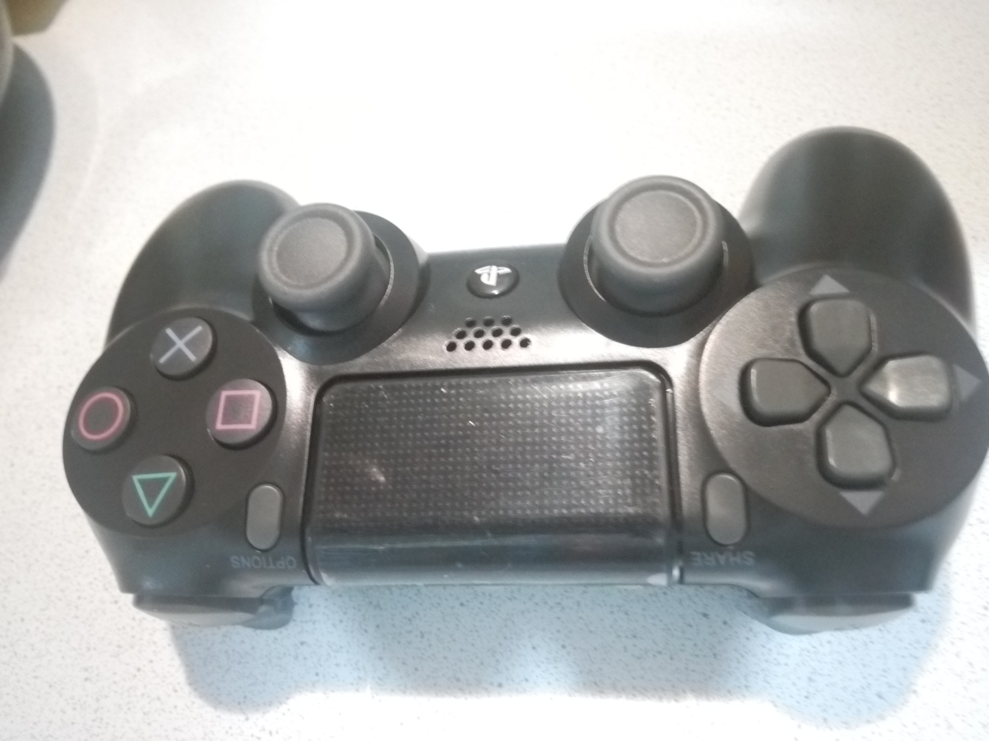 Геймпад Sony DualShock 4 v2 для Playstation 4 Black (CUH-ZCT2E) - отзывы  покупателей на маркетплейсе Мегамаркет | Артикул: 100000067497