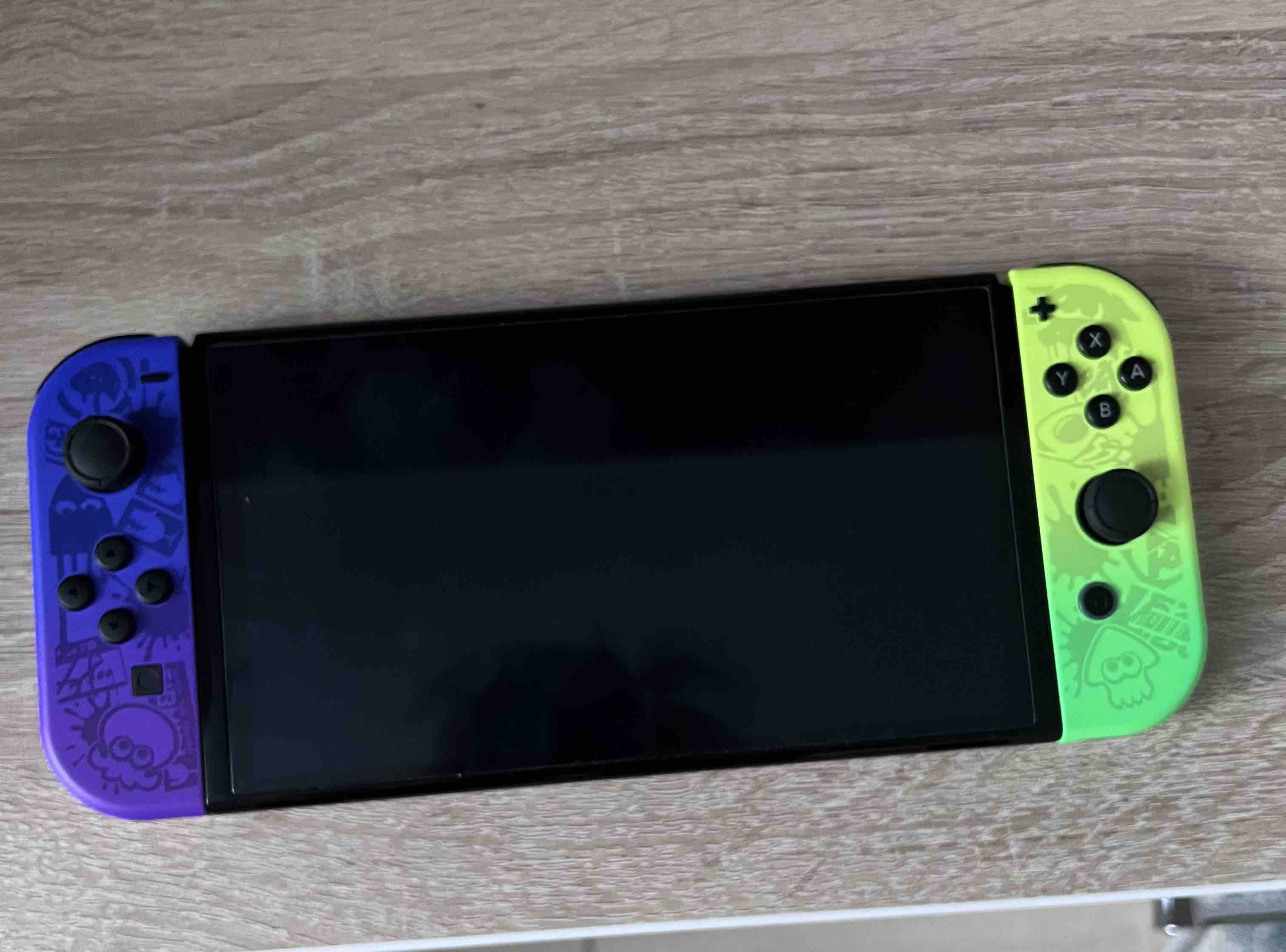 Nintendo Switch OLED 64GB (Splatoon 3 Edition) - отзывы покупателей на  маркетплейсе Мегамаркет | Артикул: 100040005628