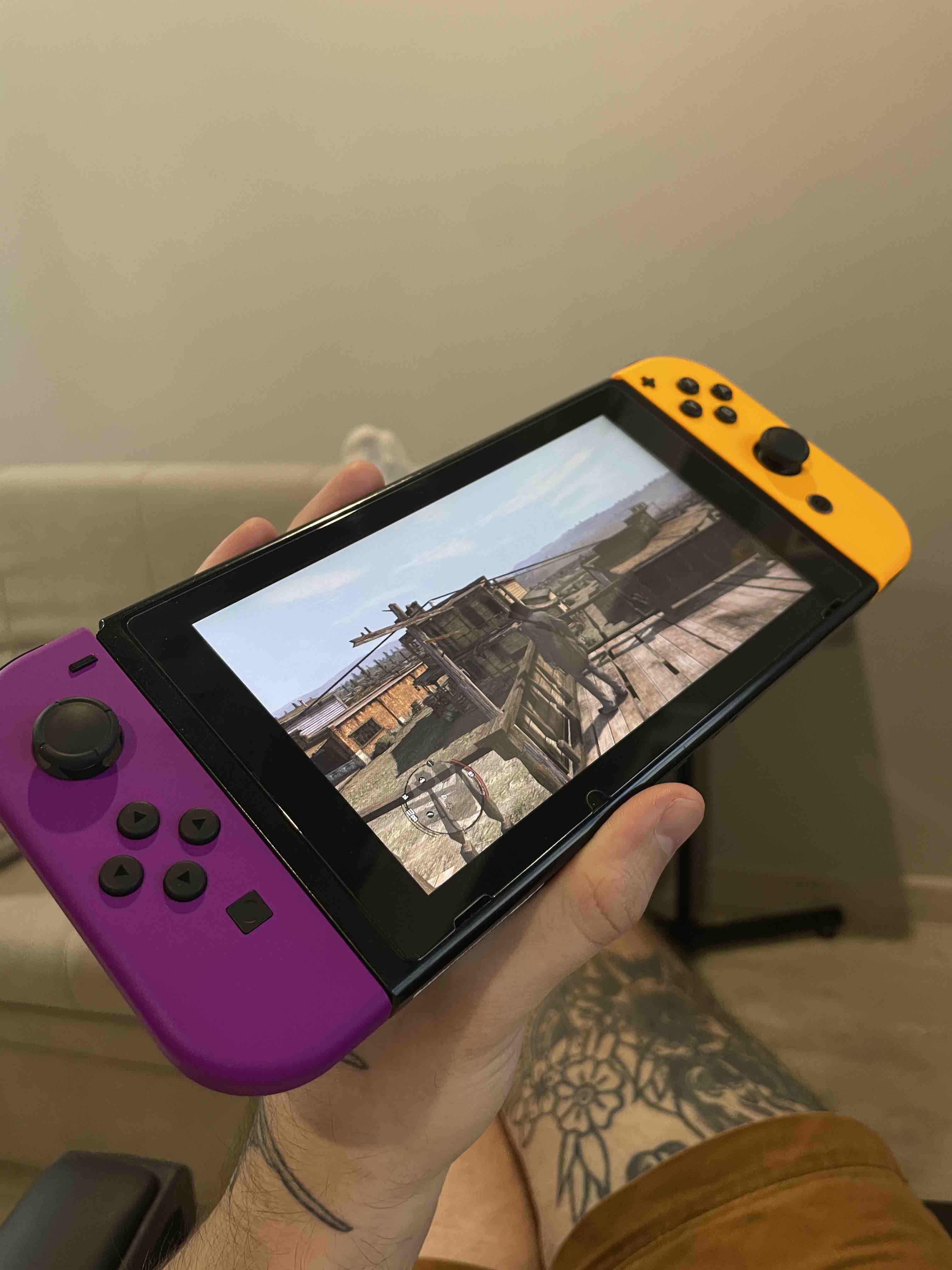 Геймпад Nintendo Joy-Con для Nintendo Switch Neon Purple/Neon Orange  (HAC-A-JAPAA) - отзывы покупателей на маркетплейсе Мегамаркет | Артикул:  100025550434